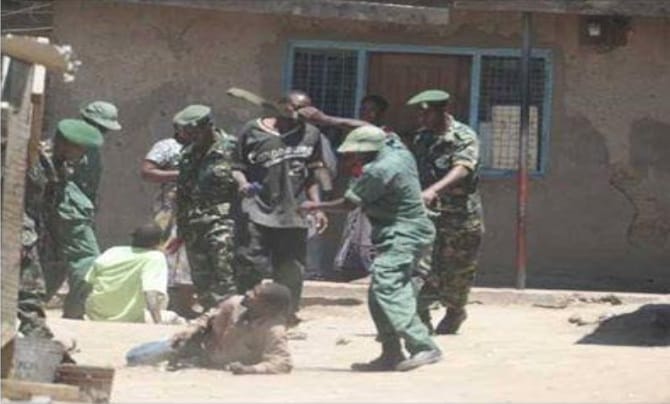 Footage shows a Tanzanian anti-poaching officer beating a suspected poacher during Operation Tokomeza. (Legal and Human Rights Center, Dar-es-Salaam)