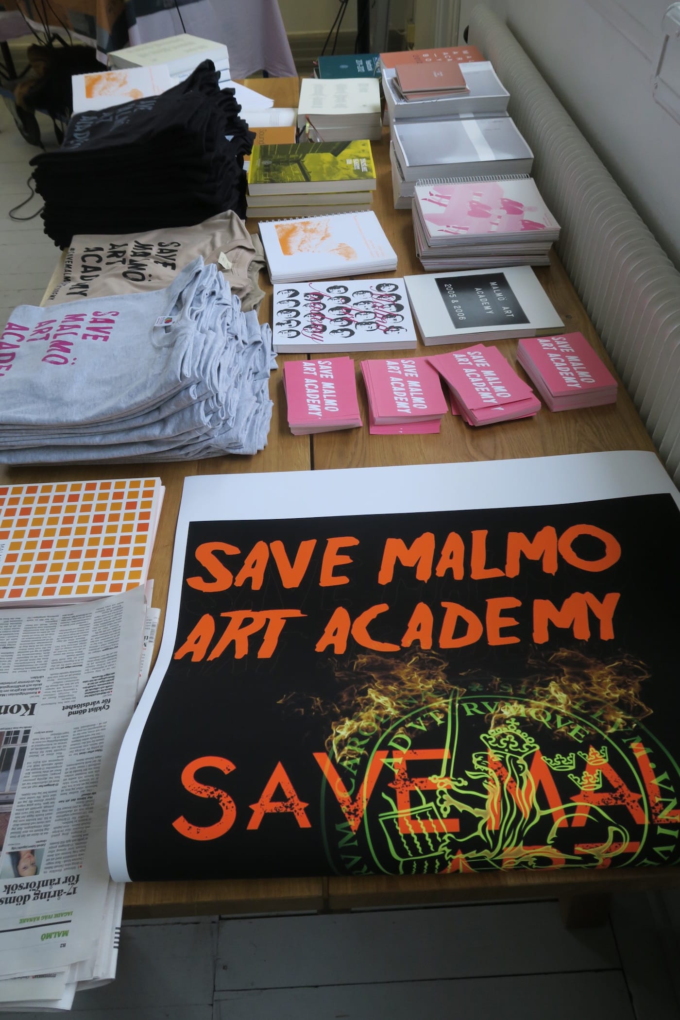 Articles, yearbooks, flyers, T-shirts an Tiril Hasselknippe's poster contribution ready for mounting for the Malmö Art Academy open house