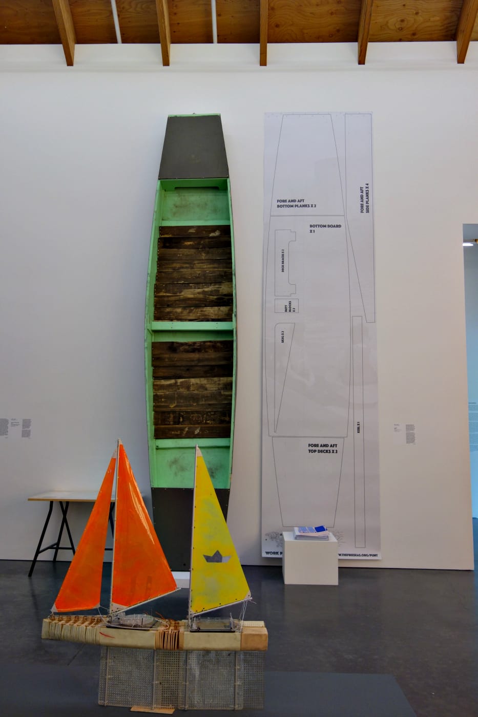 Installation view of 'Radical Seafaring' at the Parrish Art Museum, with with Cesar Harada's "Protei 010.9 Mini Cargo" (2014), a drone boat designed to clean oil spills or pick up trash