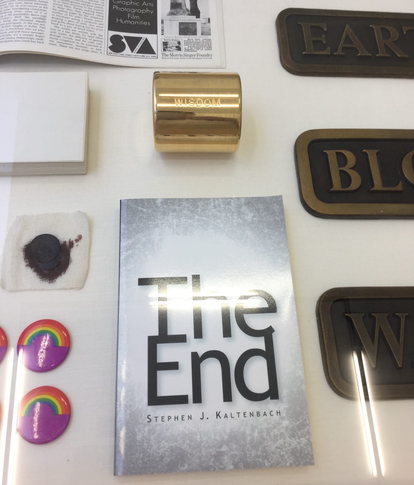 Installation view including Stephen Kaltenbach, "Wisdom" (1970–present), gold plated steel and unknown contents 7 1/2 x 9 1/2 x 7 1/2 in