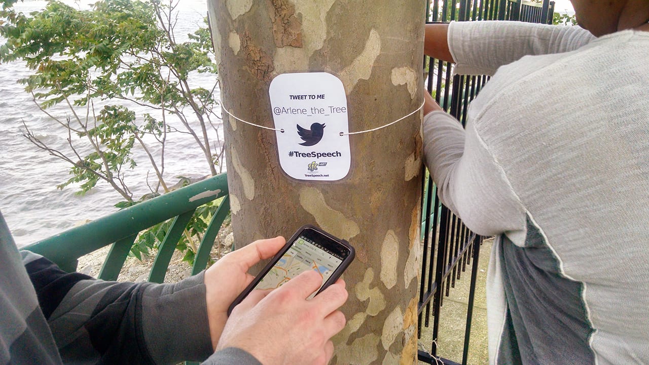Hanging a Tree Speech sign & plotting tree on OpenTreeMap.org, Society Hill Walkway, Jersey City.