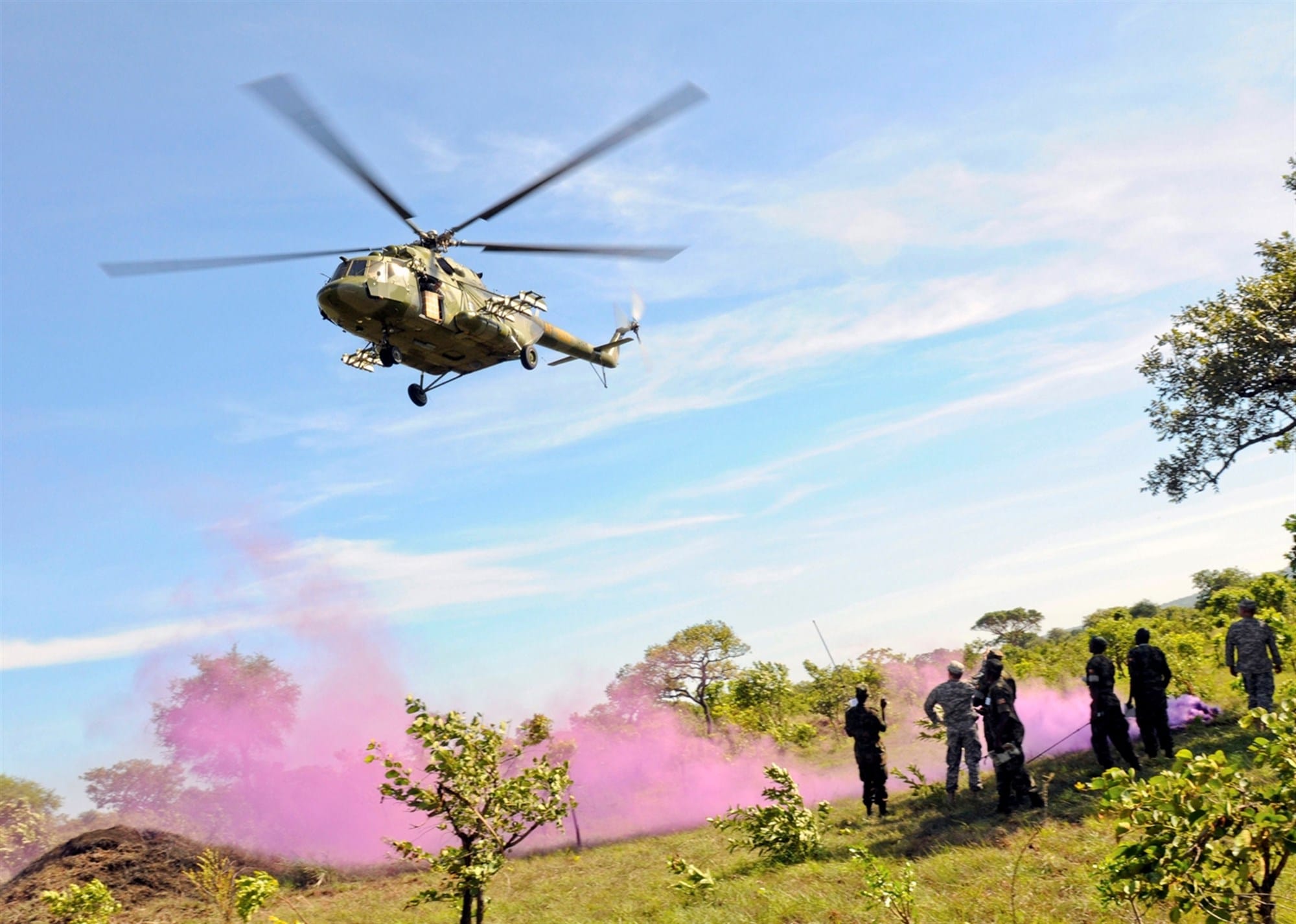 A Mi-17 helicopter of the Uganda People's Defense Force during an exercise. Ugandan troops have been accused of hunting elephants from helicopters inside the Congo. (US Army Photo)