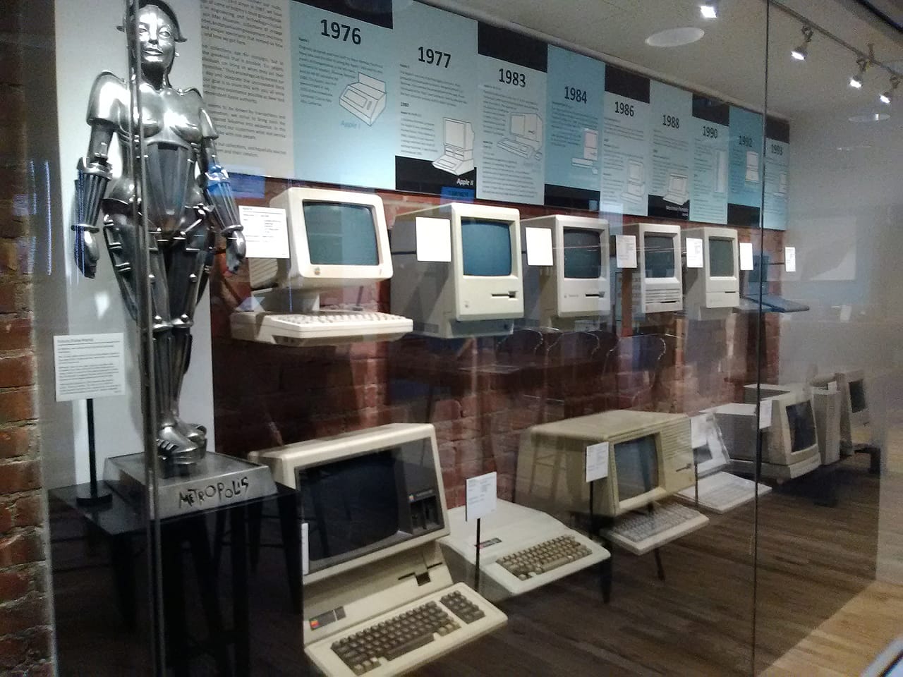 View of the Mac Museum at Tekserve; the Apple Lisa (https://en.wikipedia.org/wiki/Apple_Lisa), bottom row, third computer from left, was released in early 1983, had only 1 megabyte of RAM, and sold at $9,995.(photo by the author for Hyperallergic)