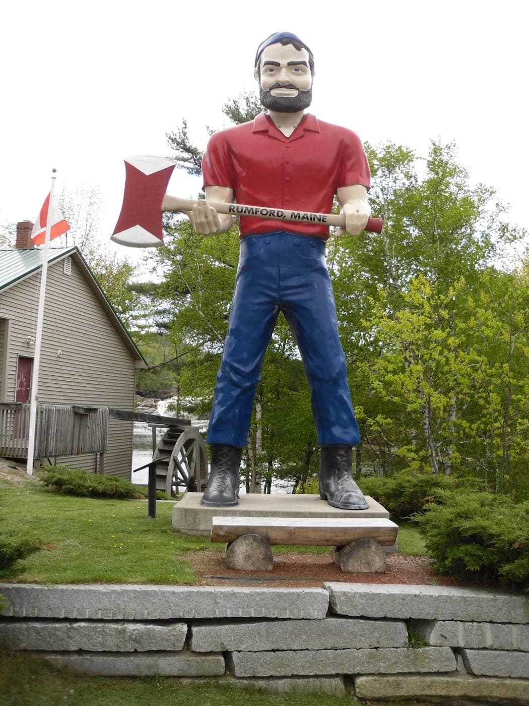 A mufler man outfitted like Paul Bunyan in Rumford, Maine (photo by Doug Kerr/Flickr)