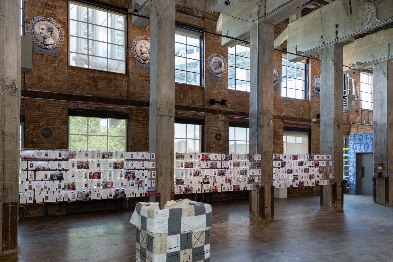 Installation view, with Sheryl Oring's, "I Wish to Say" (2016) suspended between pillars on the left.