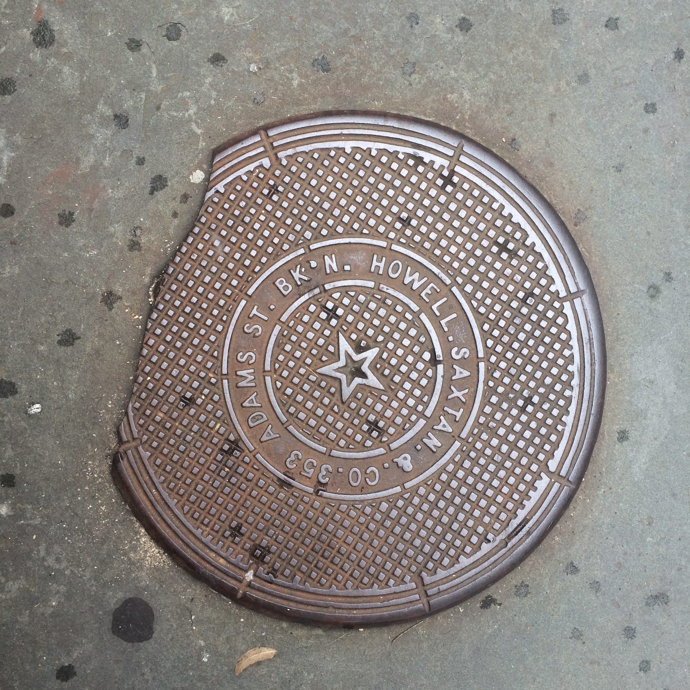 A manhole cover in Park Slope