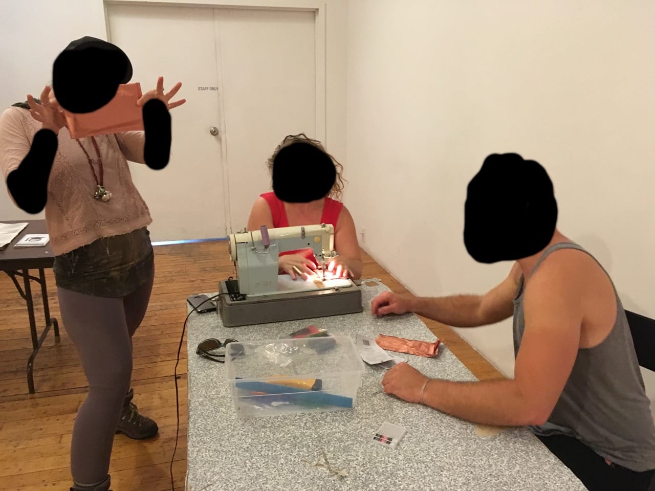 SPACES visitors making signal-blocking cell-phone pouches under the guidance of artist Tim Schwartz (all images courtesy Tim Schwartz)