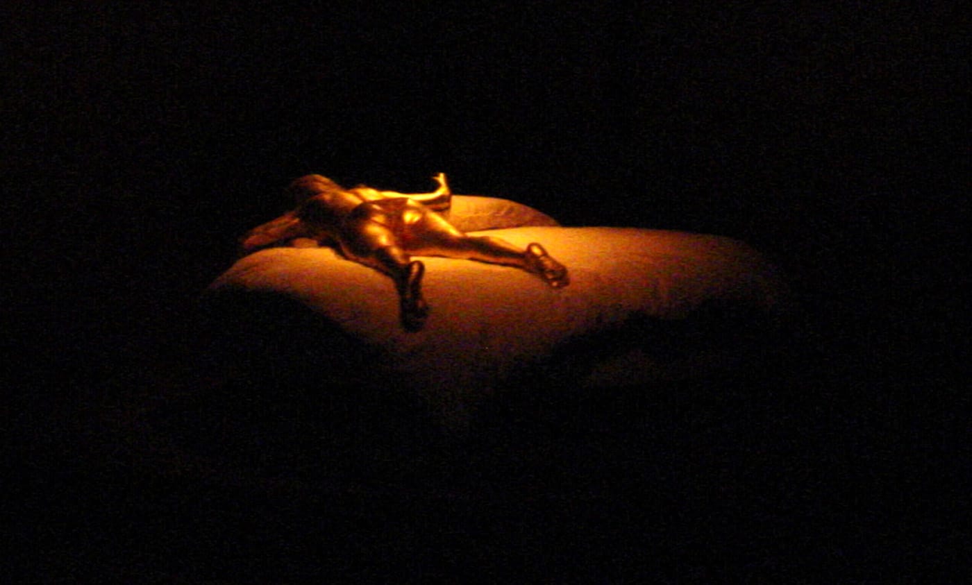 'Goldfinger' (1964) sculpture of a nnearly naked, gold-painted woman on a slowly rotating circular bed (photo by the author for Hyperallergic)