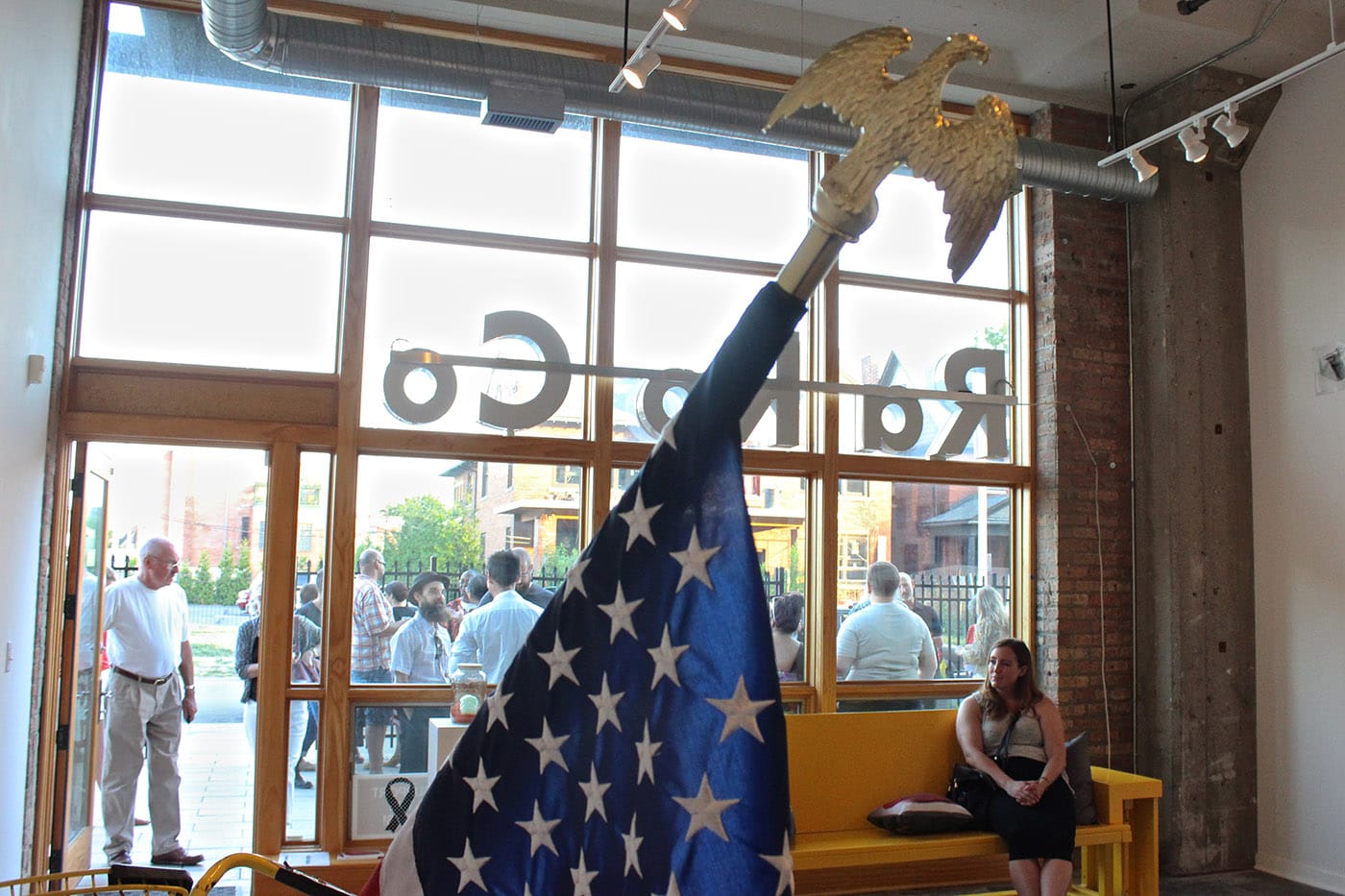 "Cart" (detail view), in the foreground, "Take it Easy" (installation view) in the background.