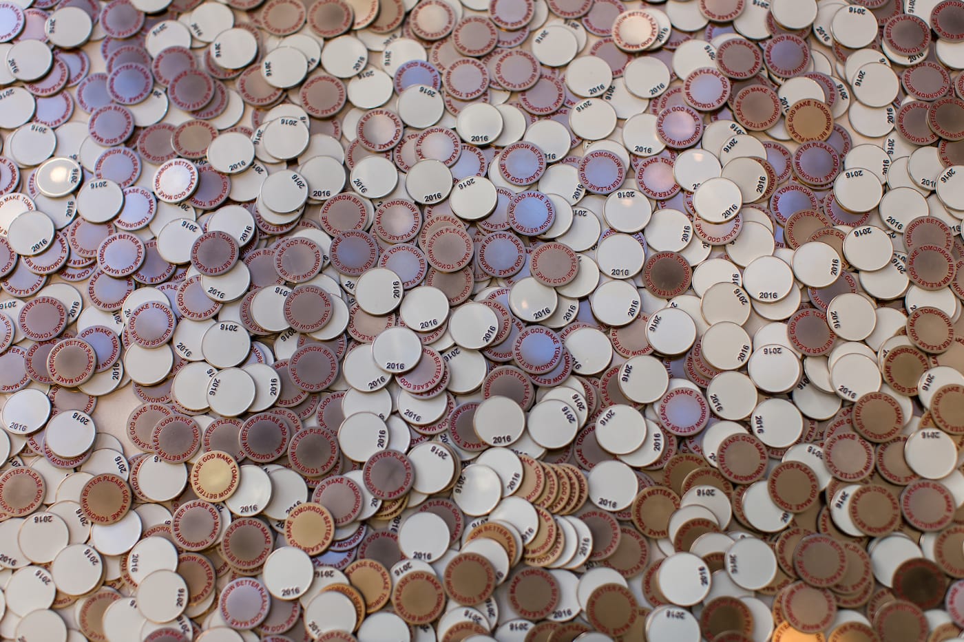 Claire Fontaine, Jeton (Please God), 2016, zinc and enamel. Courtesy of the artist and Gallery Neu, Berlin