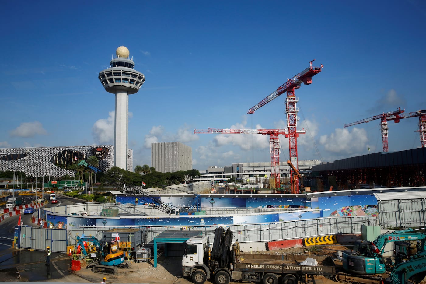 Construction takes place next to the Changi Airport control tower for Project Jewel in Singapore August 17, 2016. REUTERS/Edgar Su