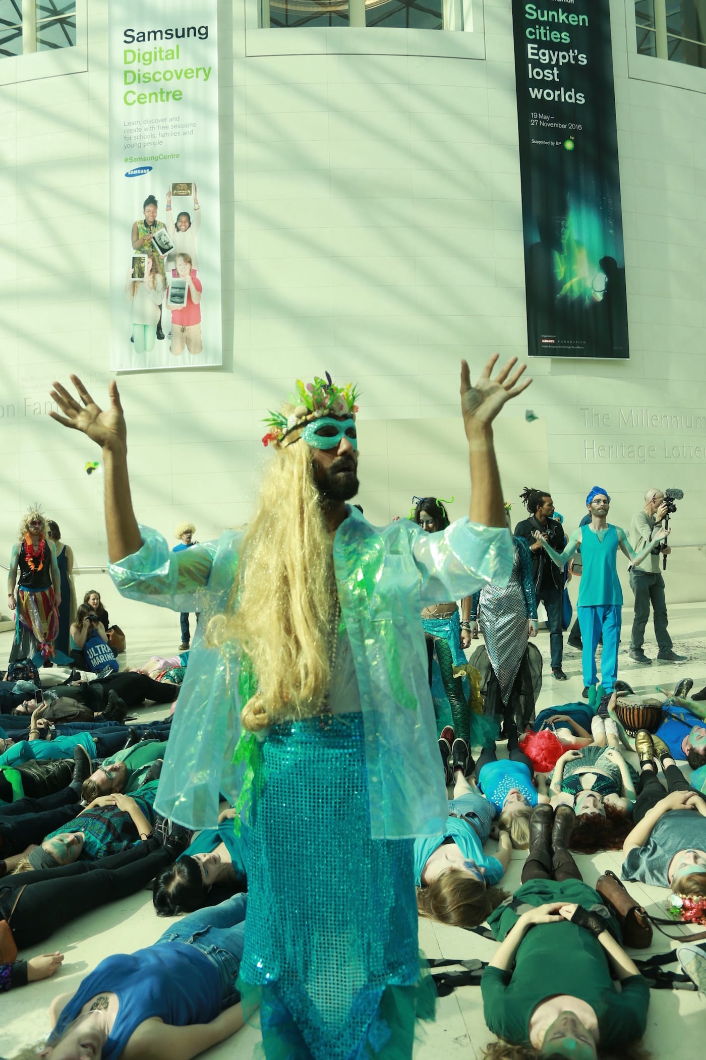 Merfolk change their tune and sing a song to kick BP out during Sunday's performance protest at the British Museum