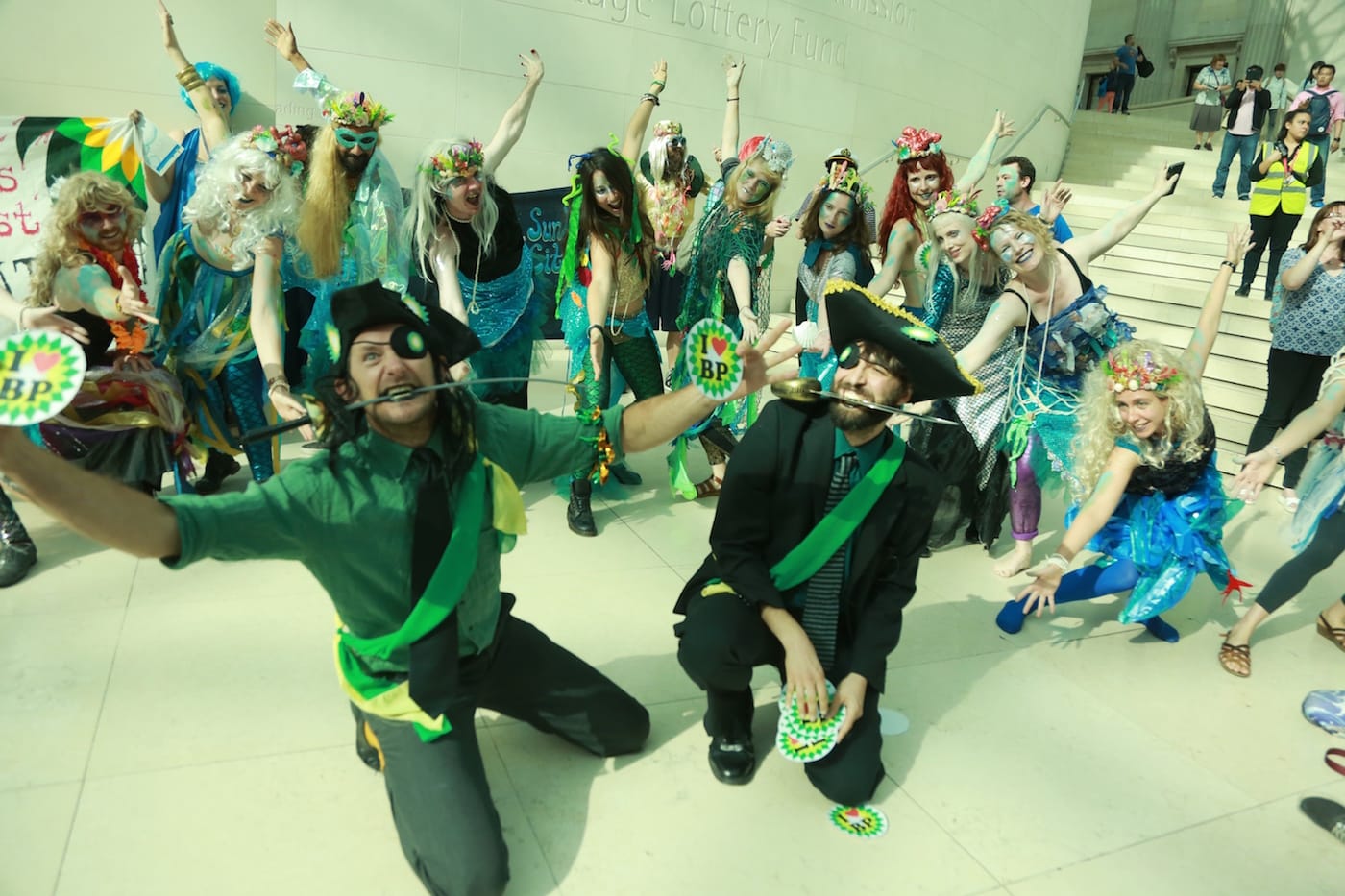 The merfolk celebrate the BP pirates in song during Sunday's performance protest at the British Museum.