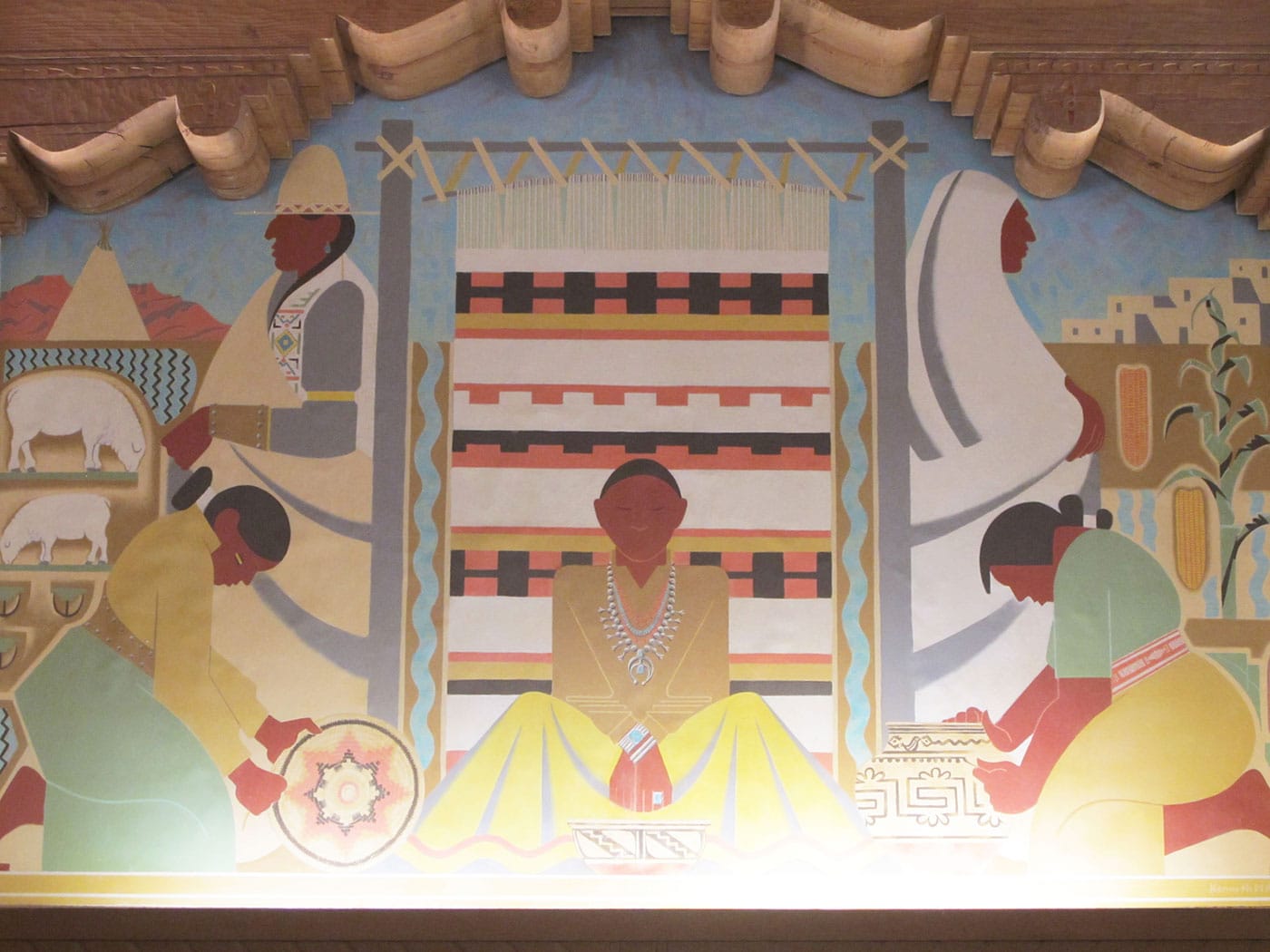 The first in a sequence of controversial murals in the University of New Mexico's main library, showing indigenous craftspeople