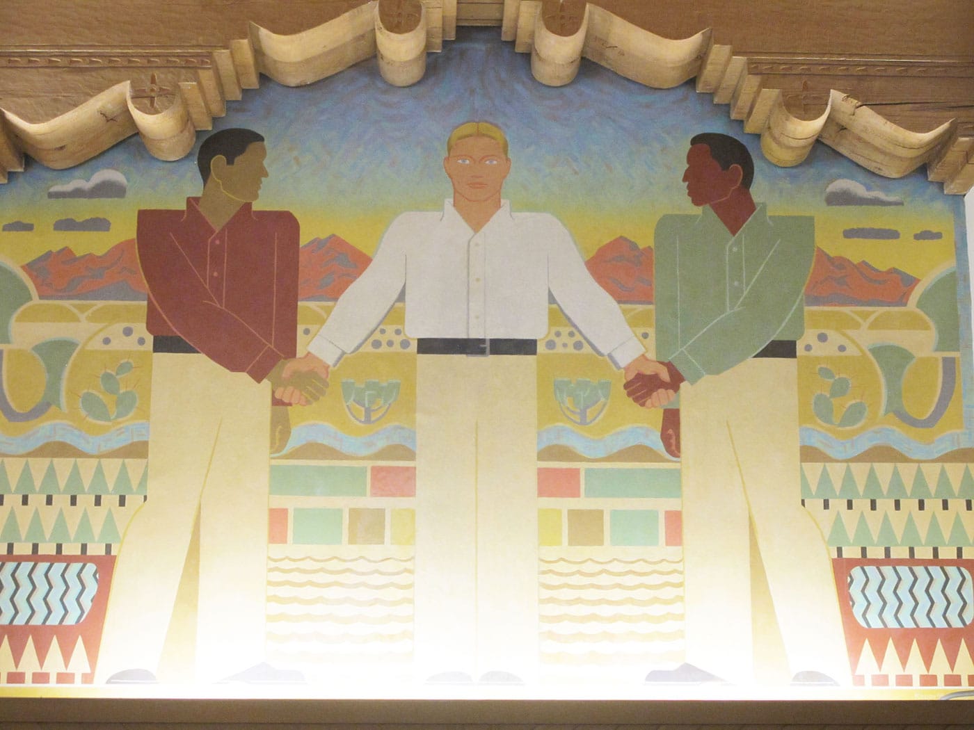 The final mural, which suggests that white people brought peace and cooperation to the region by civilizing it