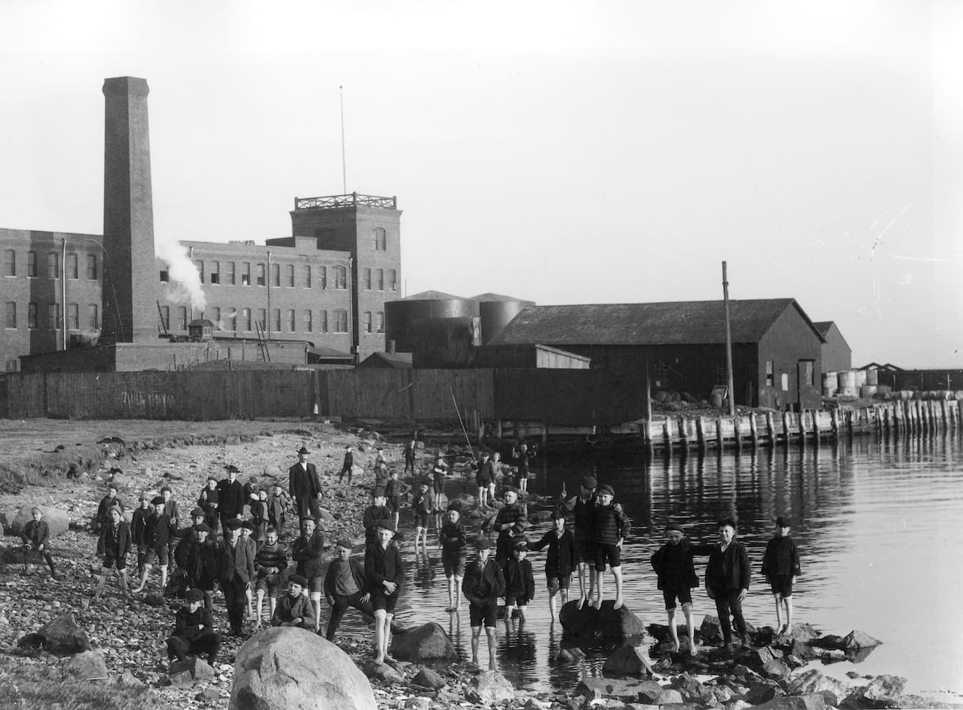 Jacob F. Weiners Jr., "Children from the Bethlehem Orphanage with the Chilton Paint Factory" (1905), reproduction of print from glass plate negative (courtesy of the Queens Borough Public Library, Long Island Division)