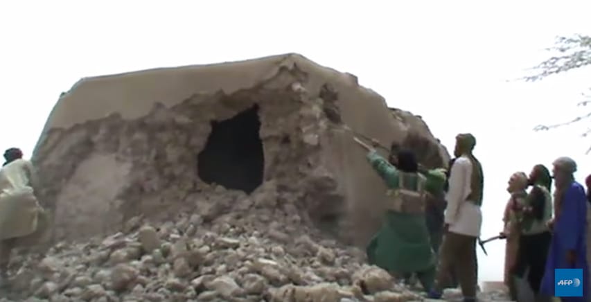Islamists in 2012 destroying shrines in Timbuktu (screenshot via AFP/Youtube)