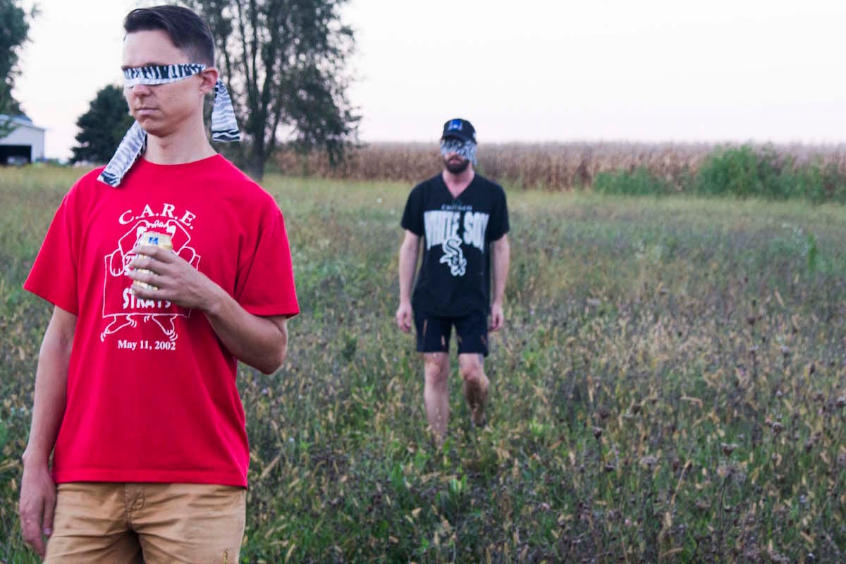 Project participants Dan Miller and Danny Floyd led blindfolded through a field on the premises of The Triumph School for Part 5 and 6 of Nick Wylie and John Paul Glover’s manual, “To The Seminal Edge: A Manual for 4-7 Revolution Seekers” 