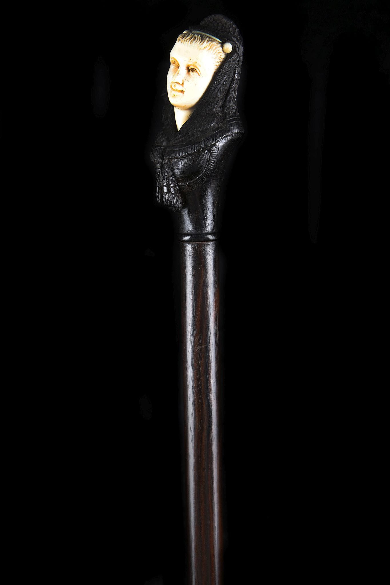 Ebony and ivory walking stick in the form of a Spanish lady (c. 1900)