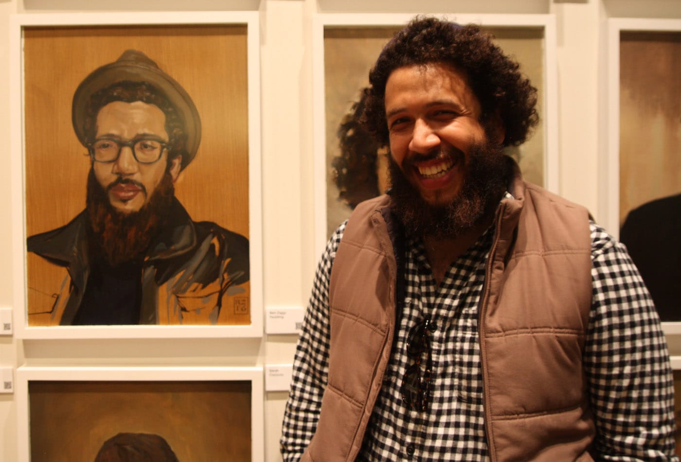 Ben Ziggy faulding with his portrait from (all photos by the author for Hyperallergic)