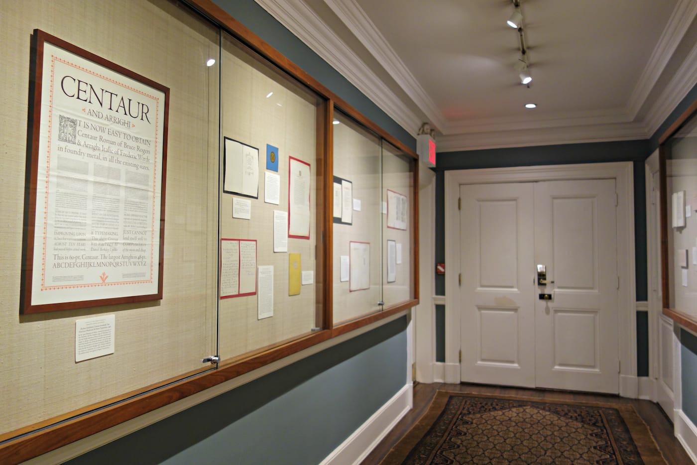 Installation view of 'The Centaur Turns One Hundred: A Century of Bruce Rogers' Centaur Type, From the Collection of Jerry Kelly' at the Grolier Club (photo by the author for Hyperallergic)