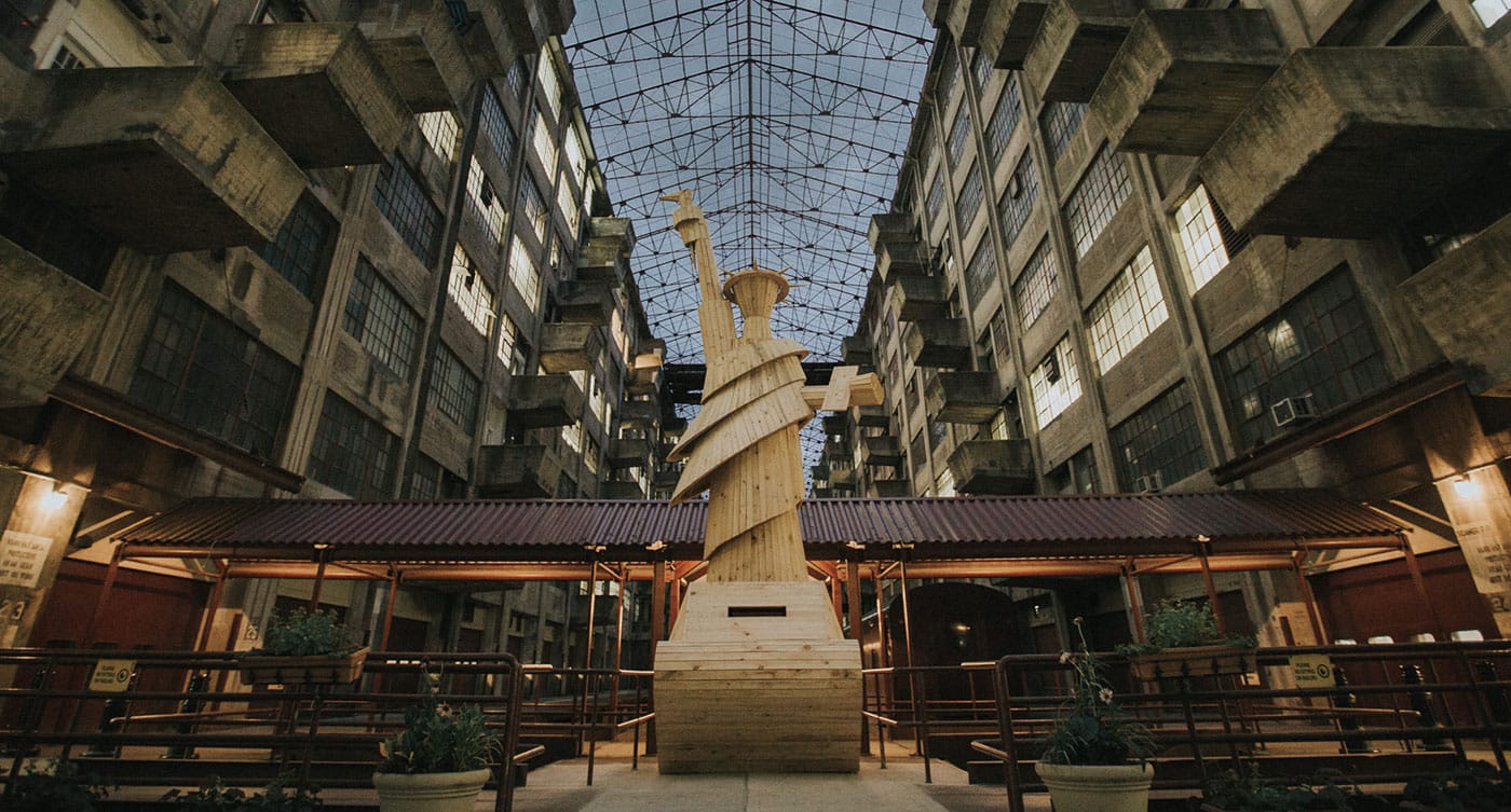 Doomocracy's Lady Liberty sculpture that greets visitors at the Brooklyn Army Terminal (photo by Will Star Shooting Stars Pro)