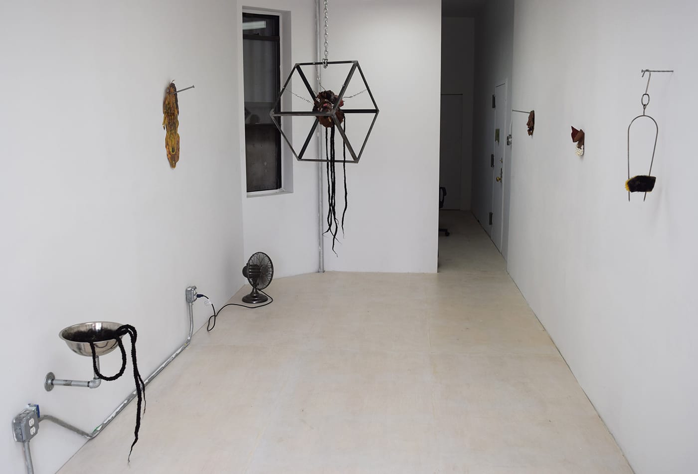 Installation view of 'Doreen Garner: Removing the Veil: Vanity as Material for Incision' at Essex Flowers