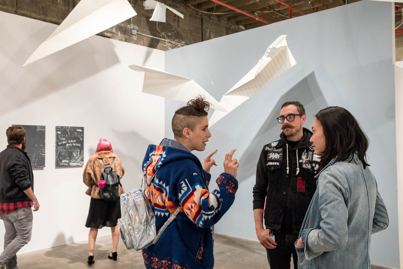 Works by Bridget Frances Quinn and giant paper airplanes by Michael Scoggins