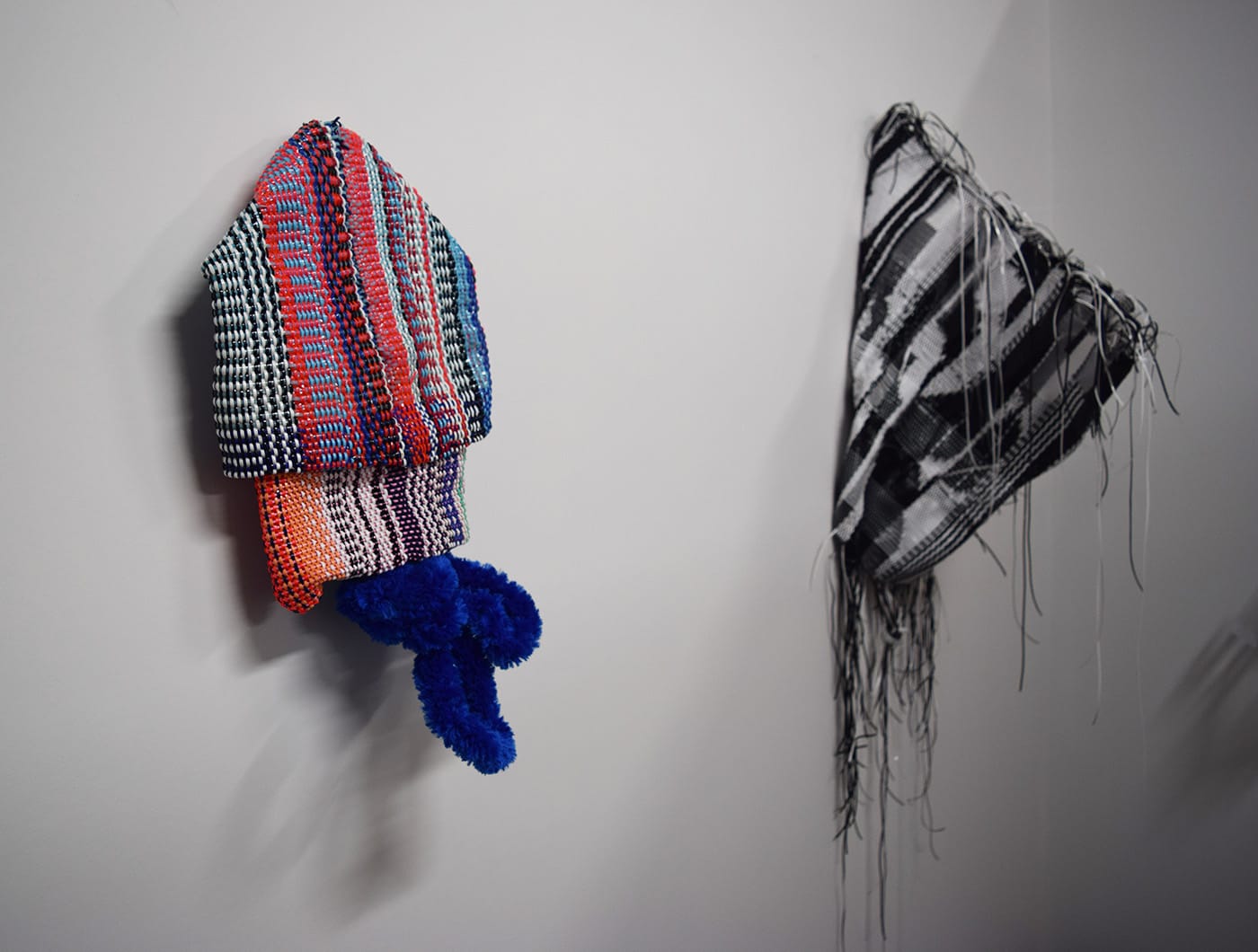 Works by Taylor McMahon, woven from friendship bracelet thread, in her studio at 540 President Street