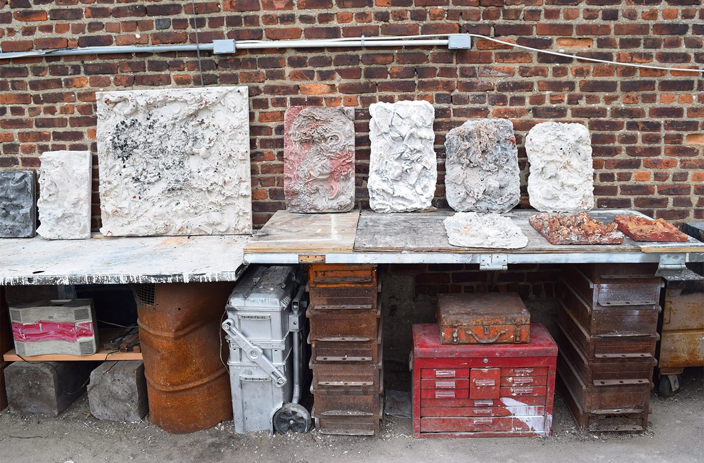 Works by artist Daniel Phillips in his outdoor studio space at President and Bond streets