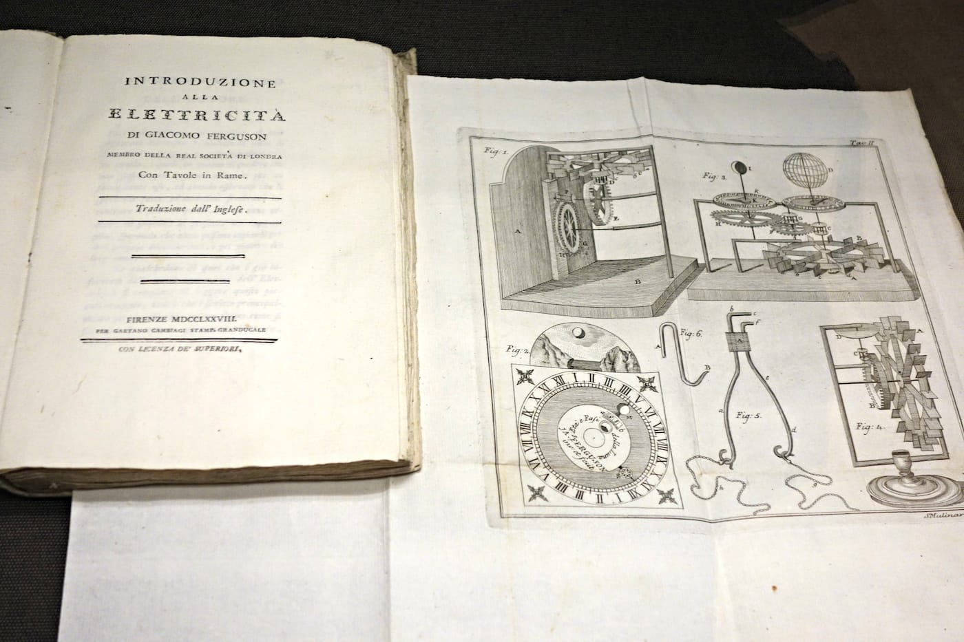 Installation view of 'On Time: The Quest for Precision. Books on Time and Timekeeping from the Linda Hall Library' at the Grolier Club (photo by the author for Hyperallergic)