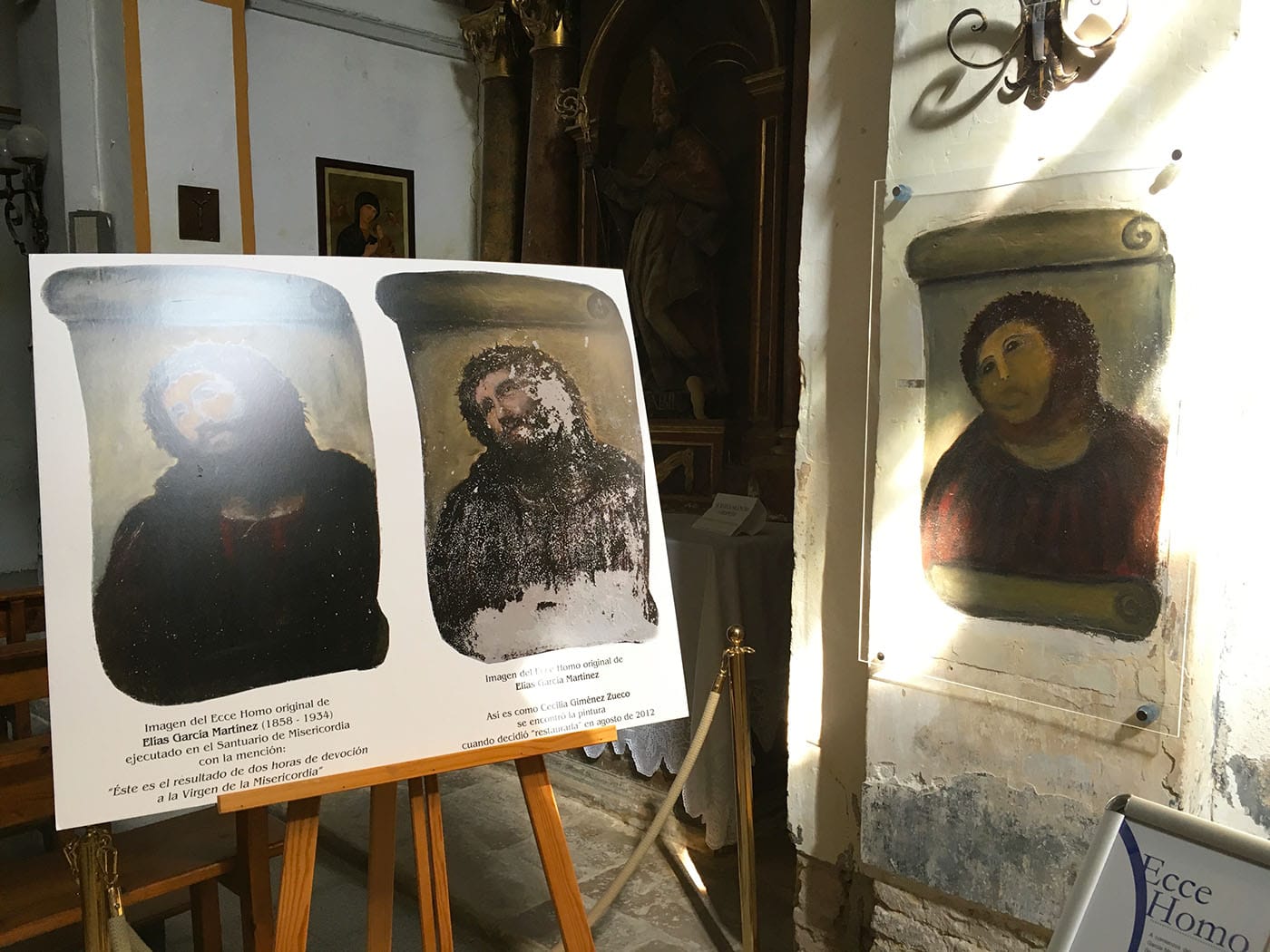 Next to Monkey Jesus are photographs of the original version of “Ecce Homo,” showing the damage it had suffered due to the chapel’s moisture and mildew.