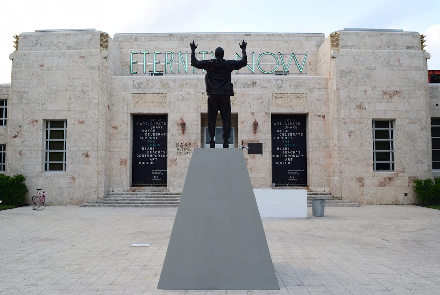 Reverse view of Glenn Kaino's "Invisible Man" (2016) in the Public sector of Art Basel Miami Beach 2016, with Sylvie Fleury's "Eternity Now" (2015) on the Bass Museum of Art façade in the background