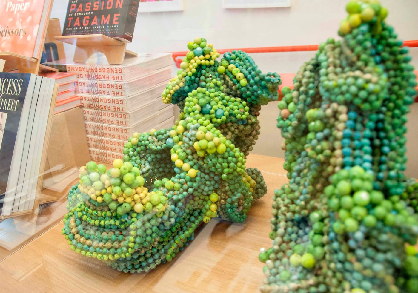 Detail of untitled sculpture by Raul de Nieves with beads, paint, and glue