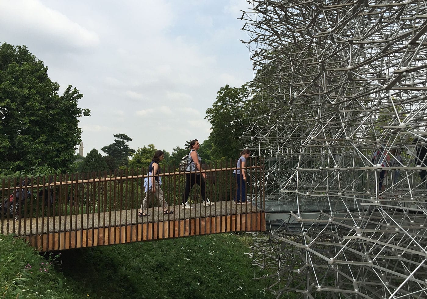 Crossing a footbridge to enter "The Hive"