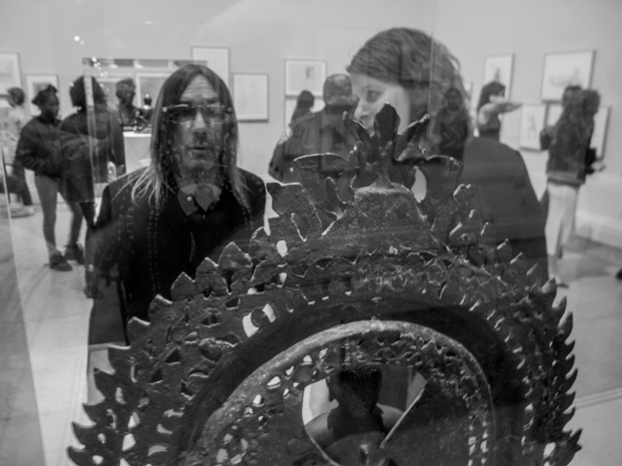 Iggy Pop admires an ancient Buddha figure (all photos by the author for Hyperallergic)