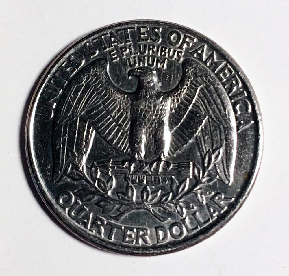 The back of the Trump quarter seems rather conventional