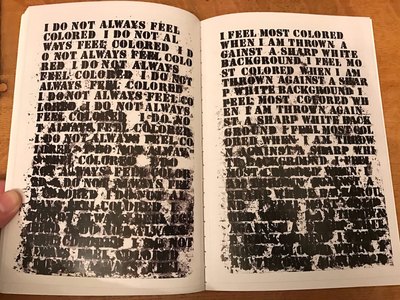 Two of the four pieces in Glenn Ligon's "Untitled: Four Etchings" (1992) reproduced in Claudia Rankine's Citizen (2014) (all photos by the author for Hyperallergic)