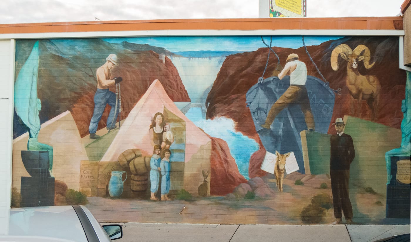 A mountain goat looks over a historical scene in a mural in Boulder, Colorado (photo by Jay Galvin/Flickr)
