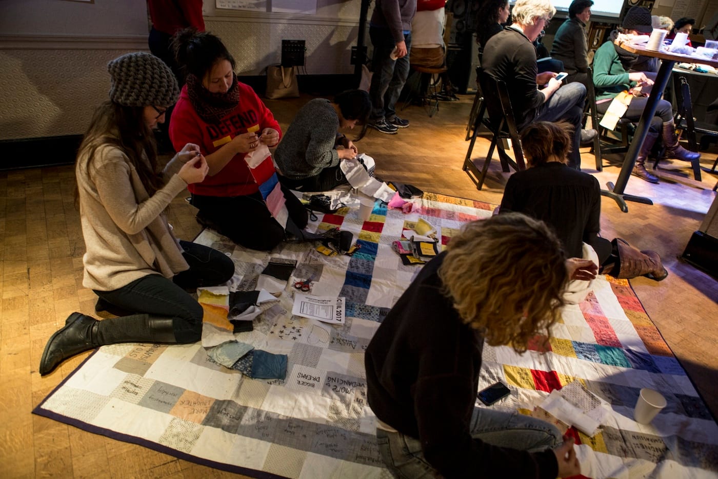Quilting for Emily Johnson/Catalyst Dance's "Then a Cunning Voice and A Night We Spend Gazing at Stars" as part of <em>Umyuangvigkaq</em> (photo by Maria Baranova, courtesy PS122)