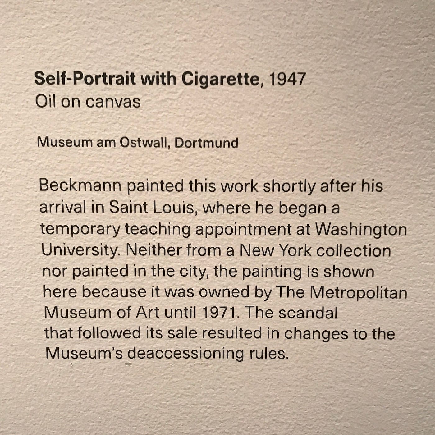 Wall text accompanying Max Beckmann, "Self-Portrait with Cigarette" (1947) in Max Beckmann in New York at the Metropolitan Museum of Art (photo by the author for Hyperallergic)