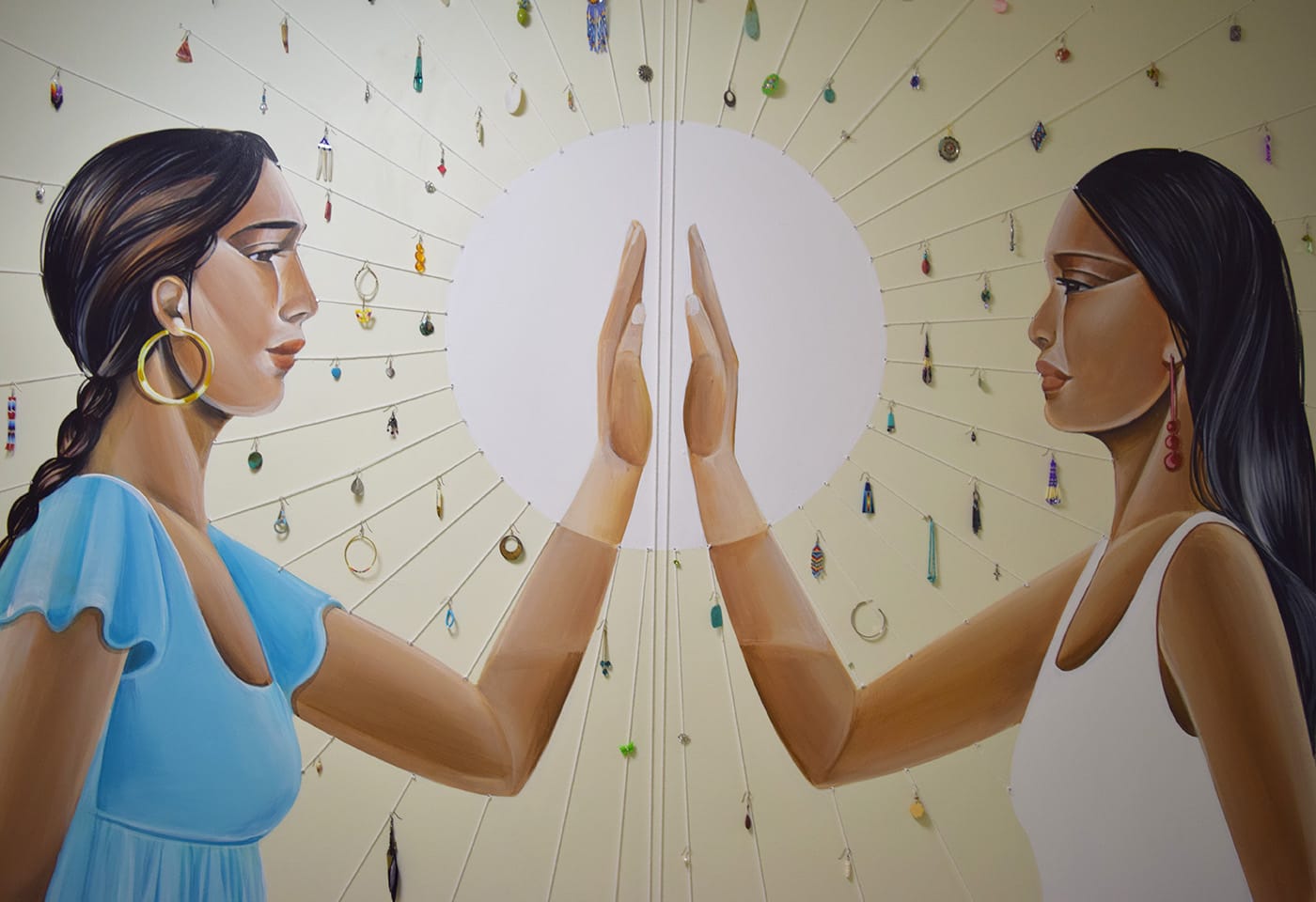 Detail view of Nani Chacon and Tanaya Winder, "On Both Sides of the Border ... Women art Still Being Murdered" (2017), acrylic, string, earrings