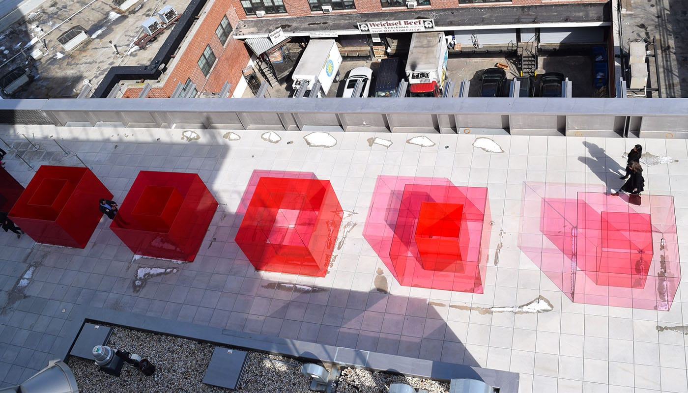 Partial view of Larry Bell's "Pacific Red II" (2017)