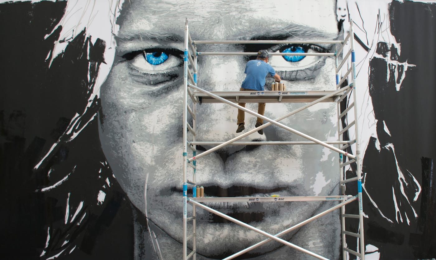Nils Westergard working on a piece at Amsterdam's future street art museum (photo by Wolfgang Josten)