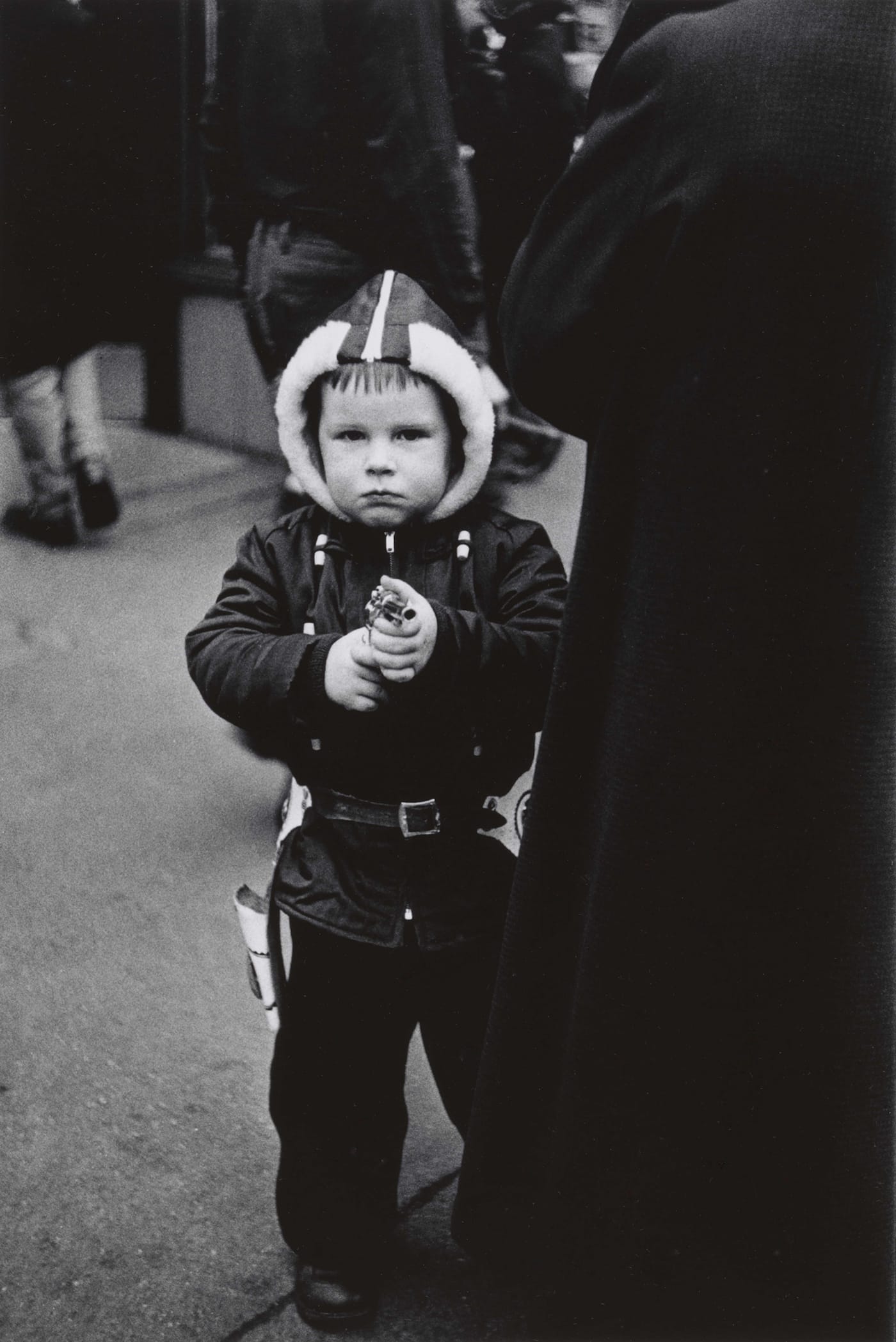 Diane Arbus, "Kid in a hooded jacket aiming a gun, N.Y.C." (1957) (courtesy The Metropolitan Museum of Art, New York; copyright © The Estate of Diane Arbus, LLC; all rights reserved)