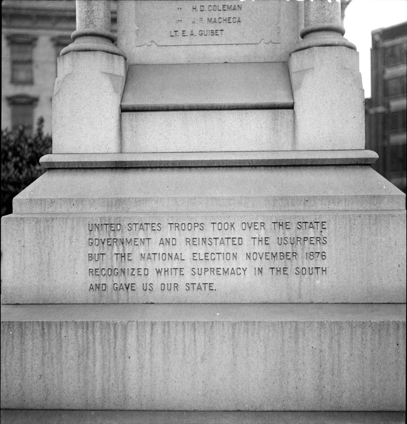 Dorothea Lange, "One side of the monument erected to race prejudice. New Orleans, Louisiana" (1936) (via Wikimedia Commons)