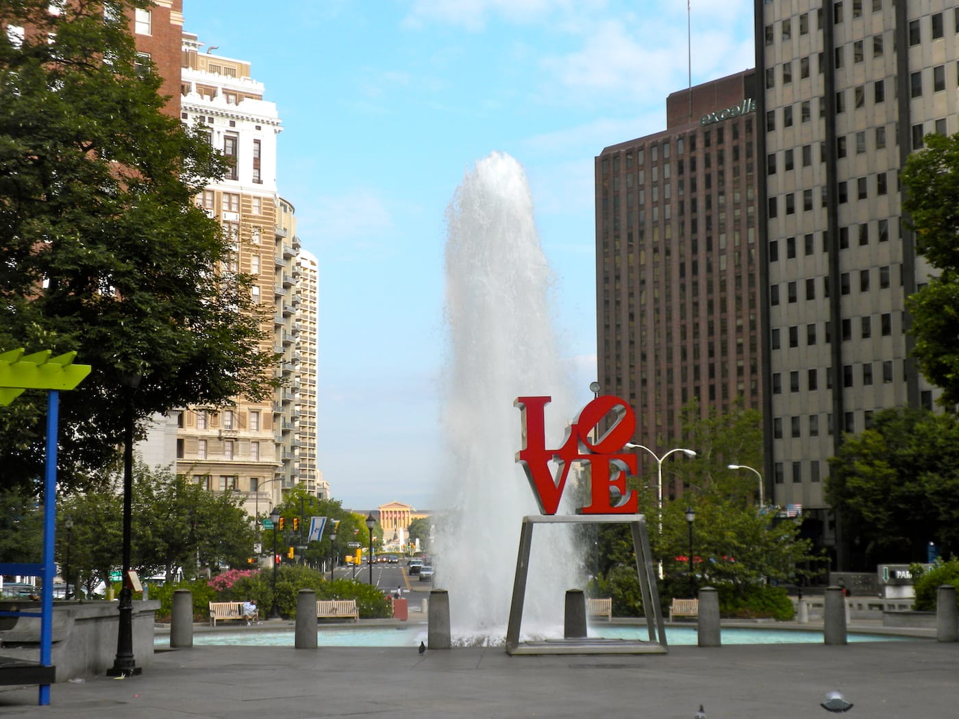 Robert Indiana's sculpture "LOVE" atop its former pedestal — which is now up for auction — in Philadelphia (photo by Smallbones, via Wikimedia Commons)