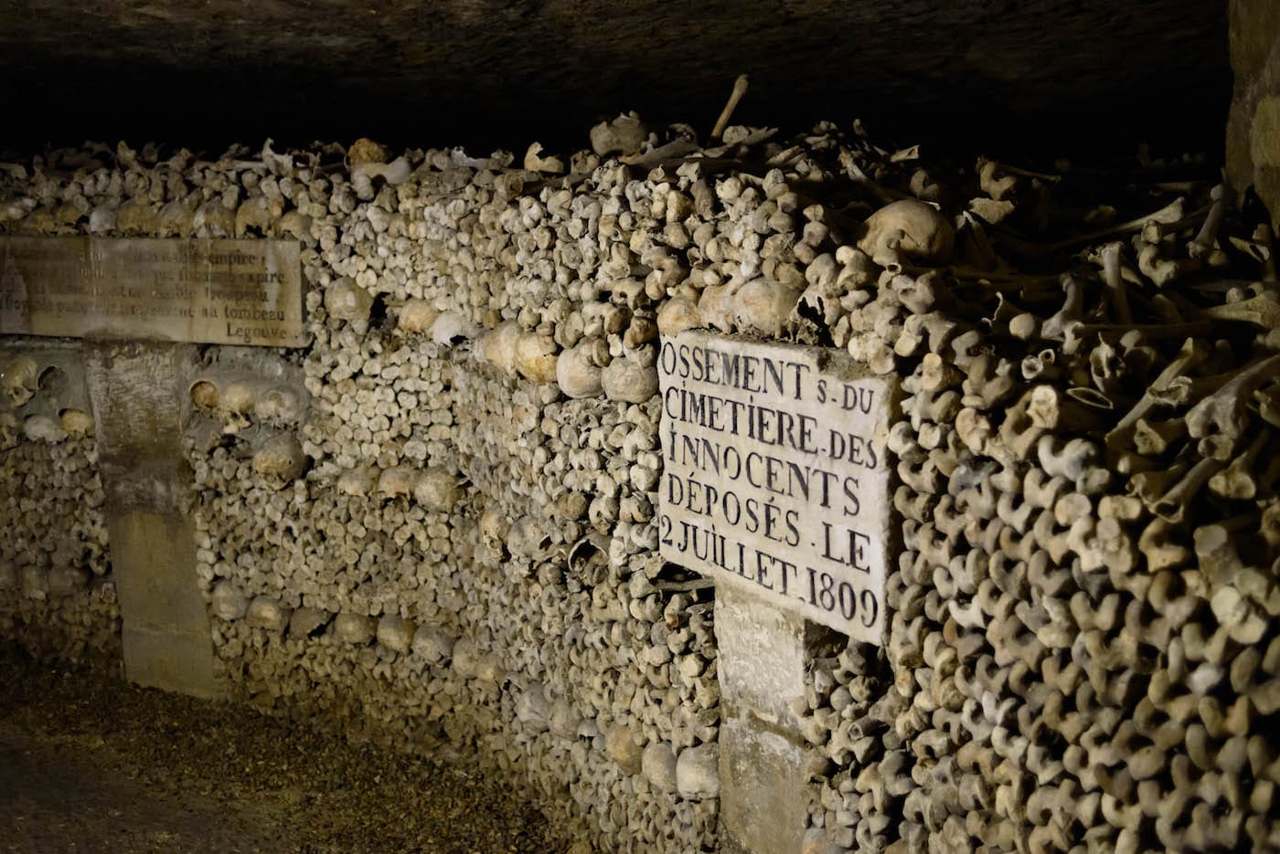 The Paris catacombs (photo by Joe deSousa, via Wikimedia Commons)