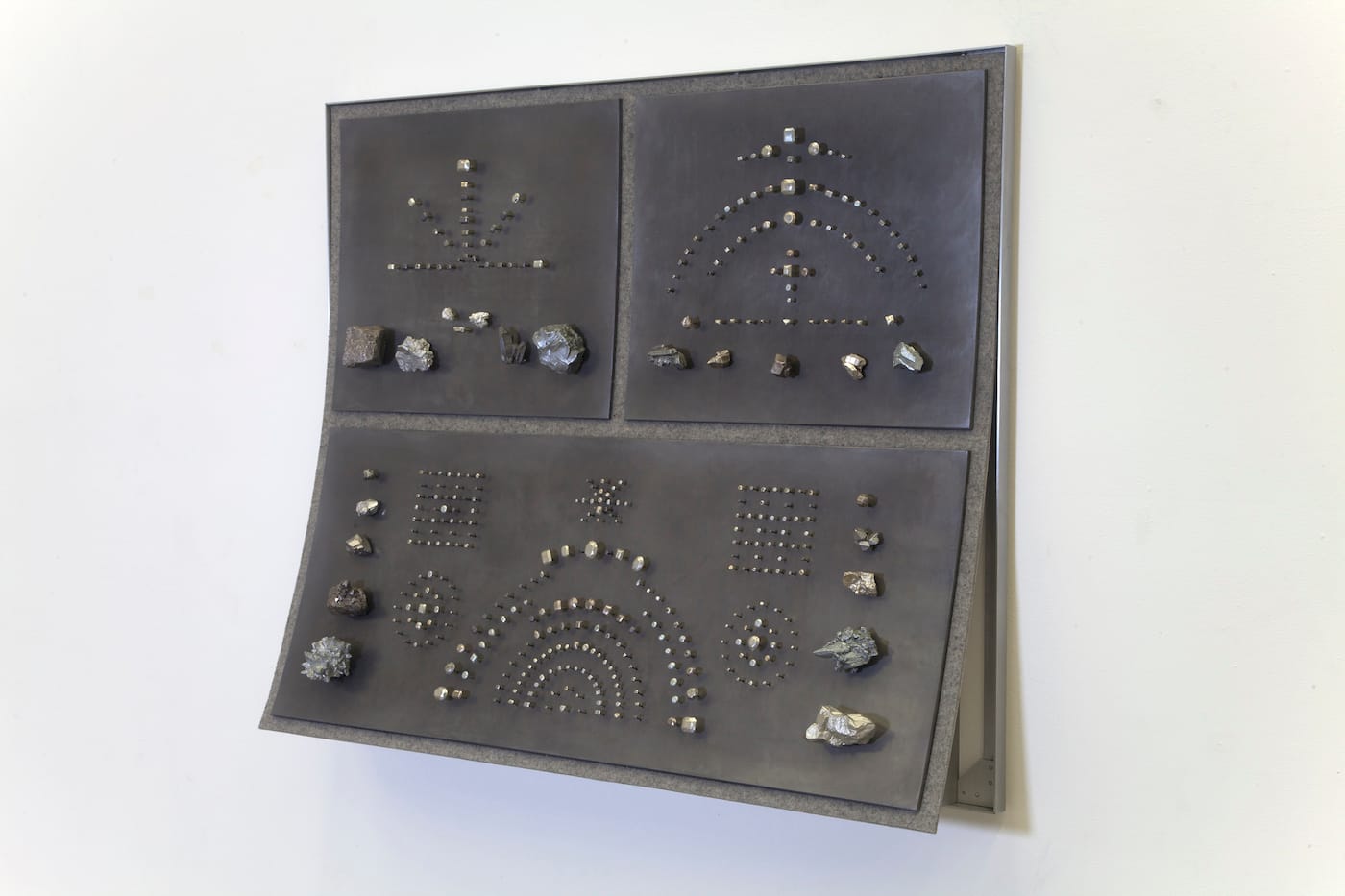 John Stoney, "Gems" (2017), elemental aluminum, antimony, bismuth, cadmium, indium, iron, lead, nickel, silver, tin, zinc, felt, 40 1/2 x 48 x 9 1/2 in