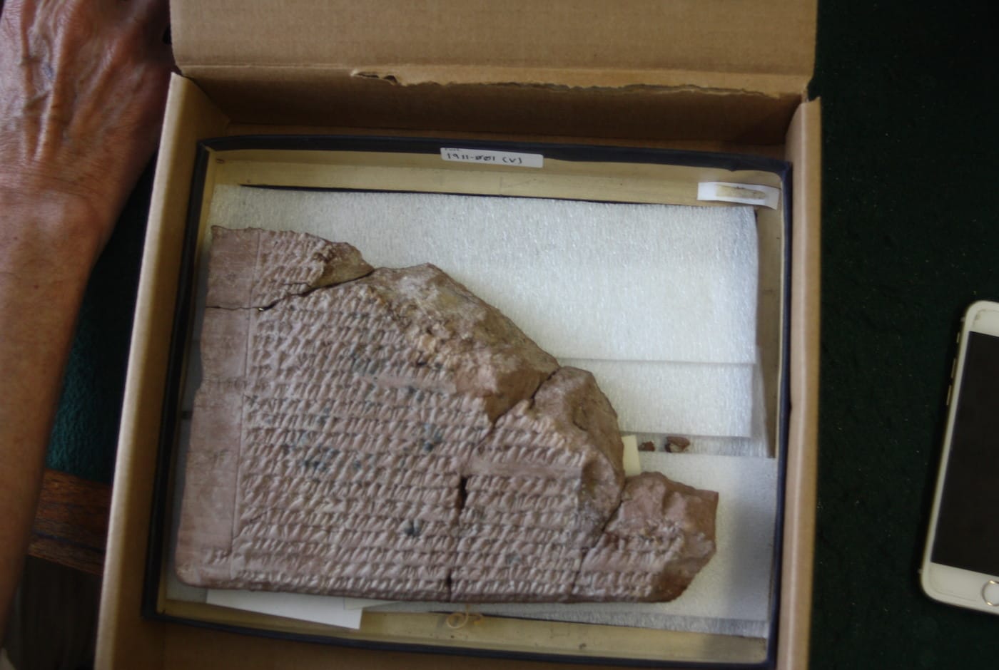 A tablet from the Persepolis Collection on Matthew Stopler's desk at the Oriental Institute at the University of Chicago